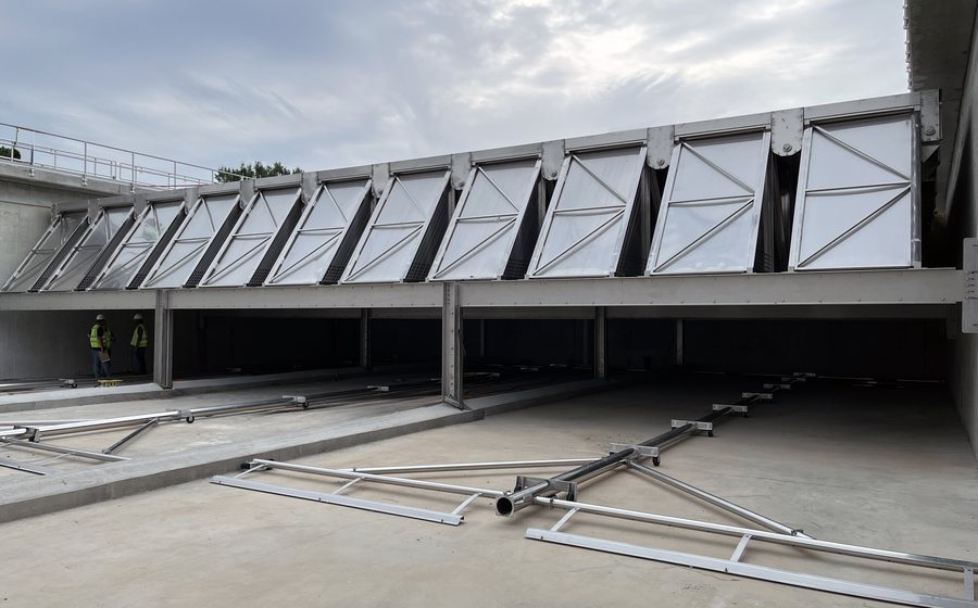 Mega-VAC sludge collection spanning a clarifier basin, Raleigh NC
